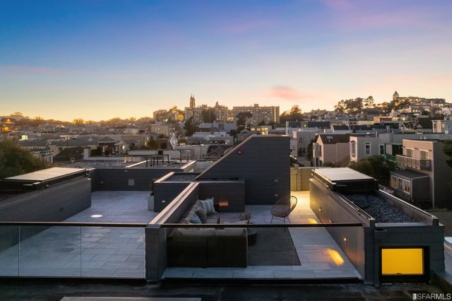 a view of a balcony with city view