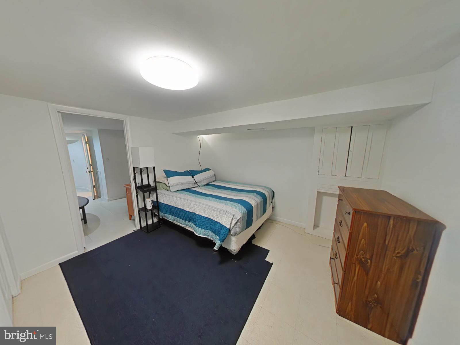 12807 Crisfield Road Silver Spring, MD 20906 - Photo 19 of 30 Cozy basement retreat with modern charm.