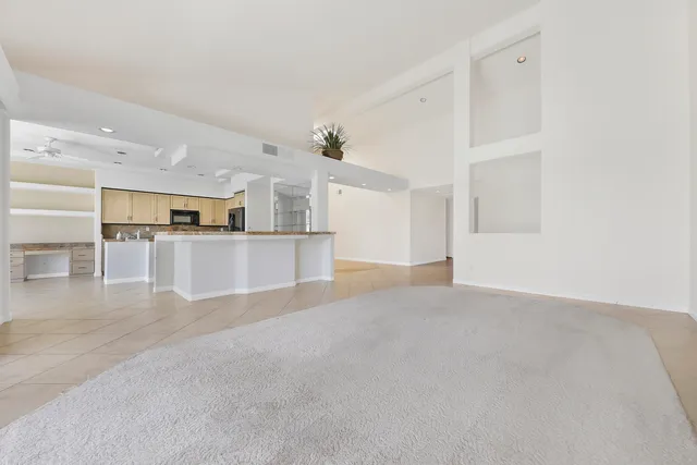 a view of a kitchen with a sink
