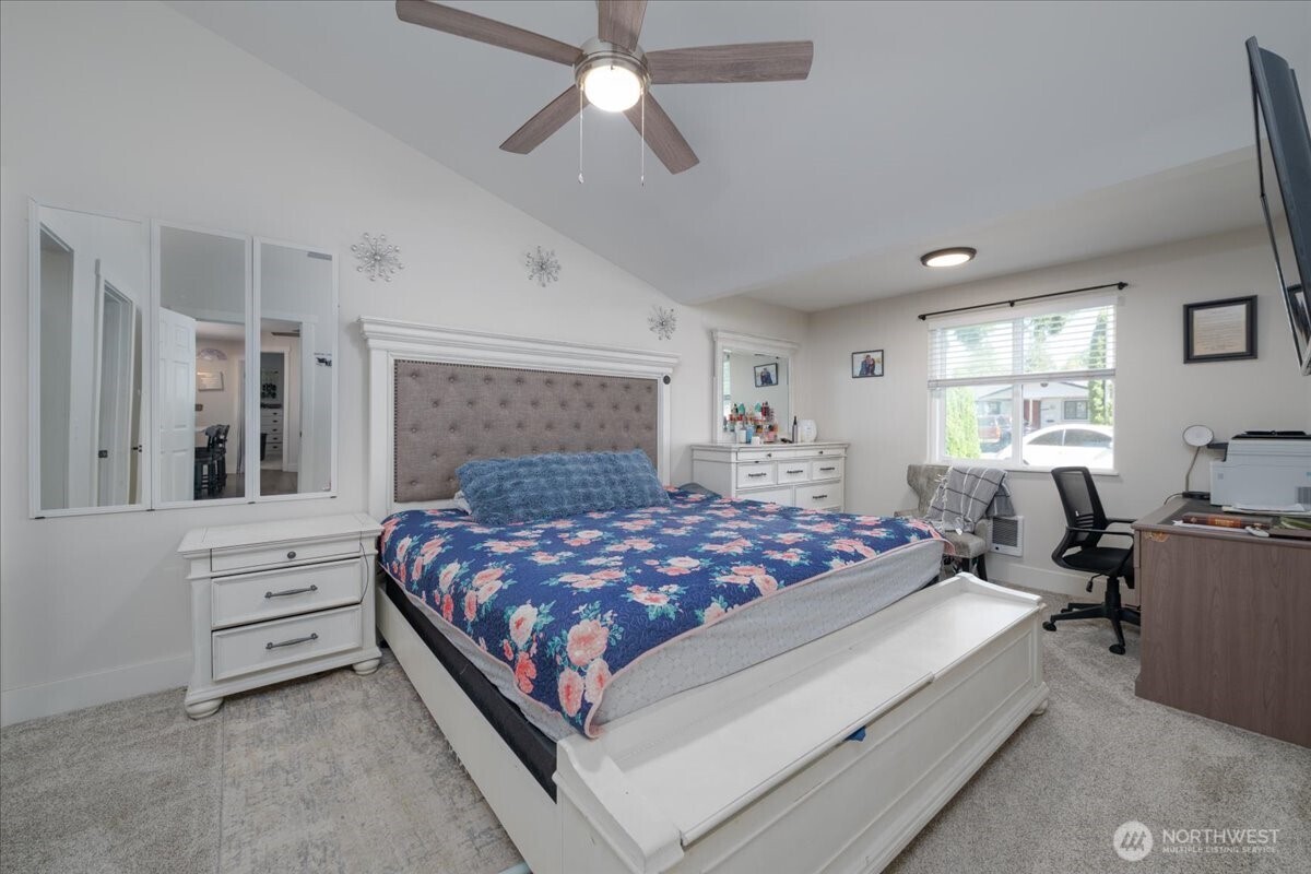 533 Fidalgo Street Sedro-Woolley, WA 98284 - Photo 11 of 37 a bedroom with a large bed and a window