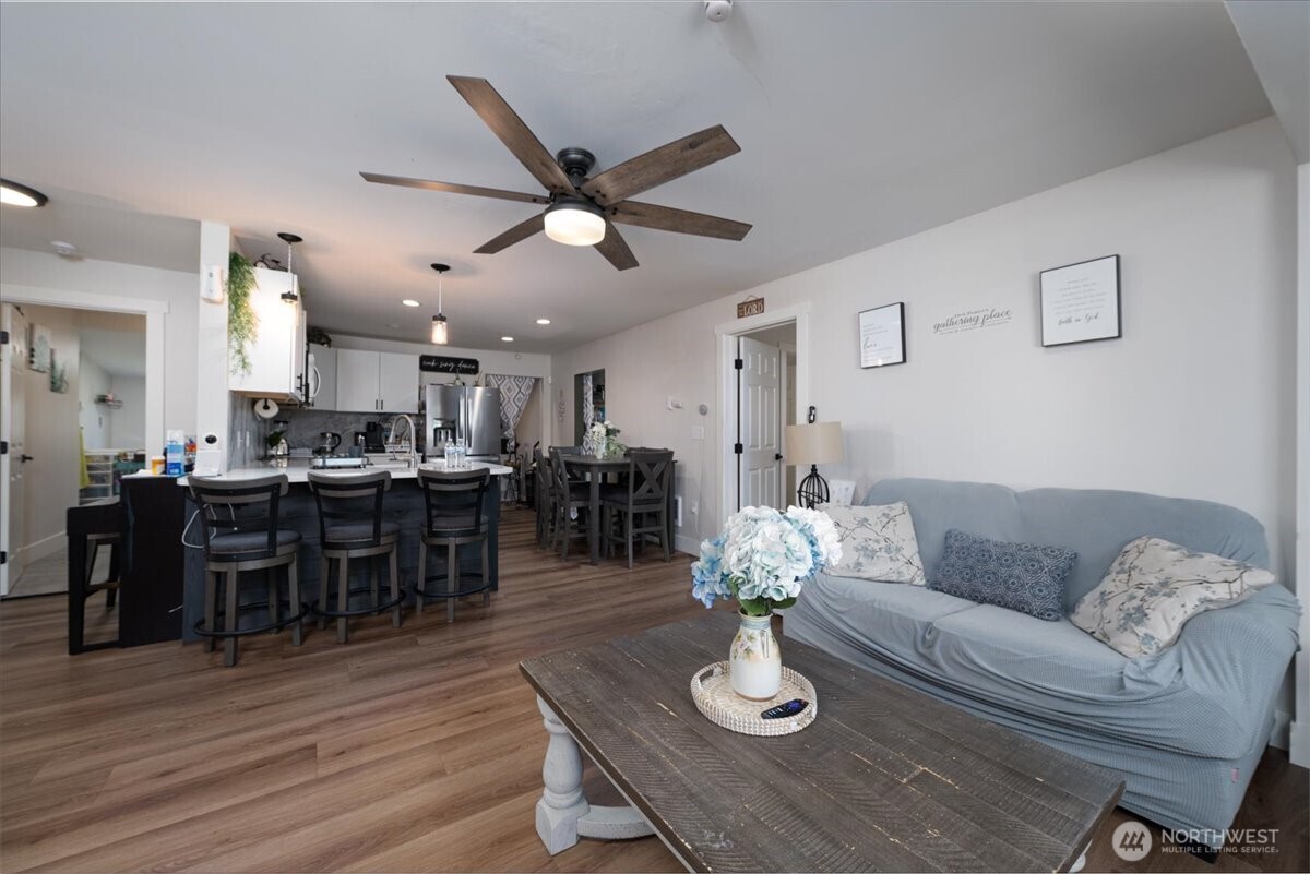 533 Fidalgo Street Sedro-Woolley, WA 98284 - Photo 6 of 37 a living room with furniture kitchen and a dining table