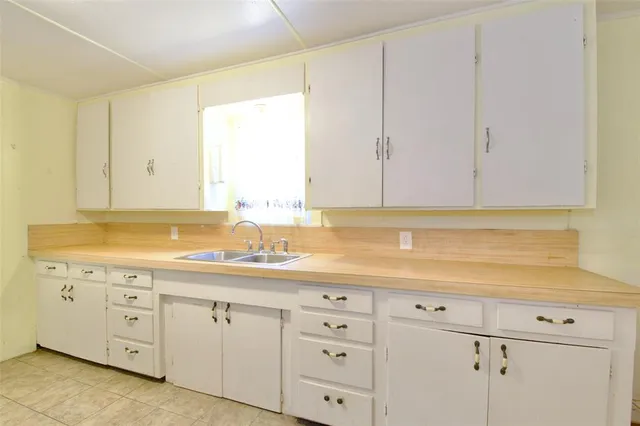 a sink with a cabinets