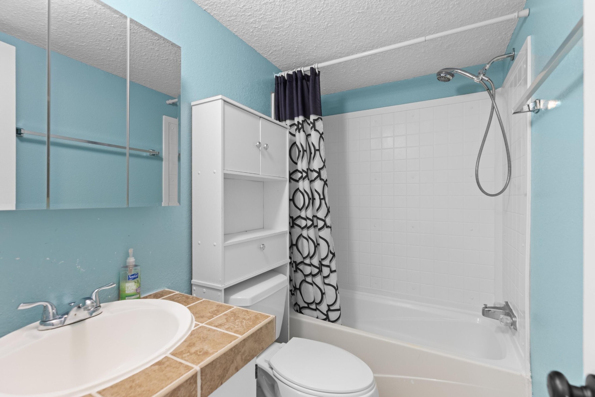 309 Rhodes Road New Market, TN 37820 - Photo 15 of 30 a bathroom with a sink toilet and shower