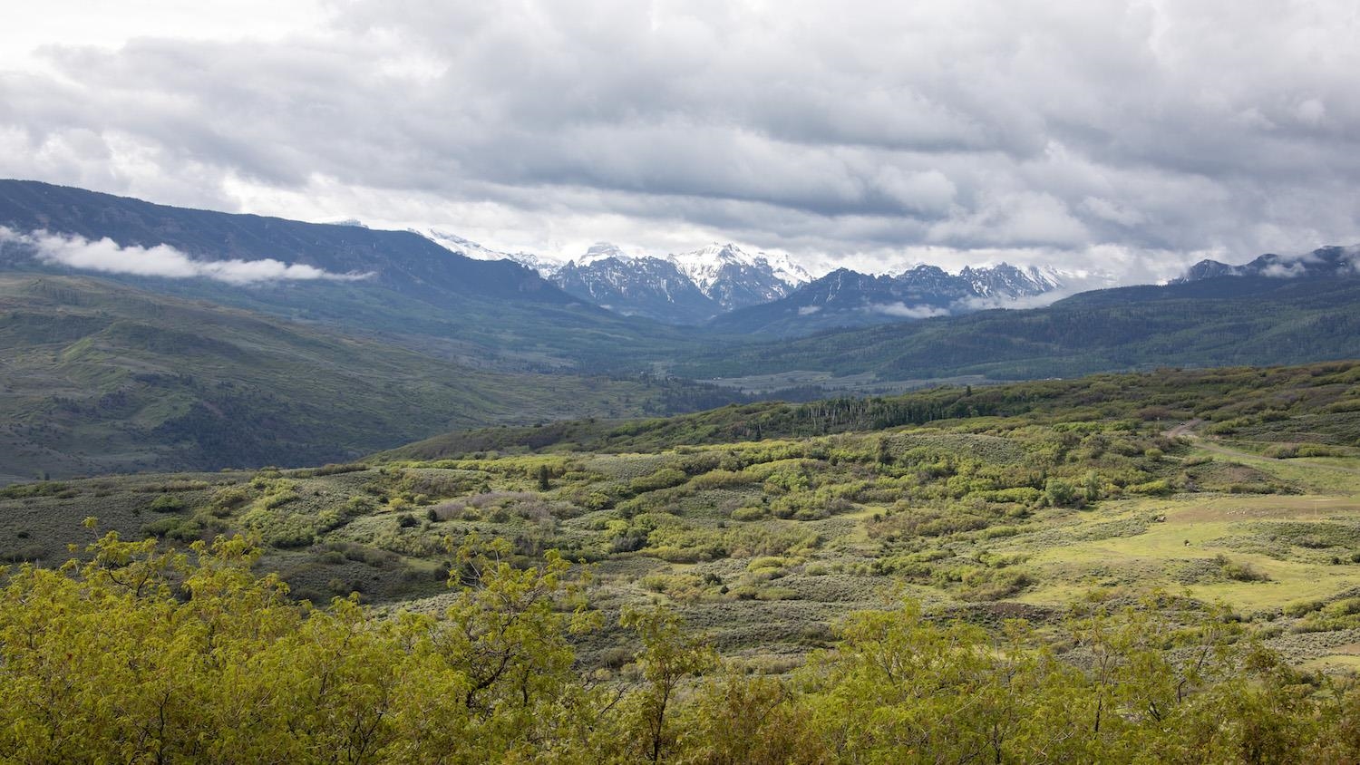 22000 P77 Road Montrose, CO 81403 - Photo 2 of 37 a view of an lake and mountain