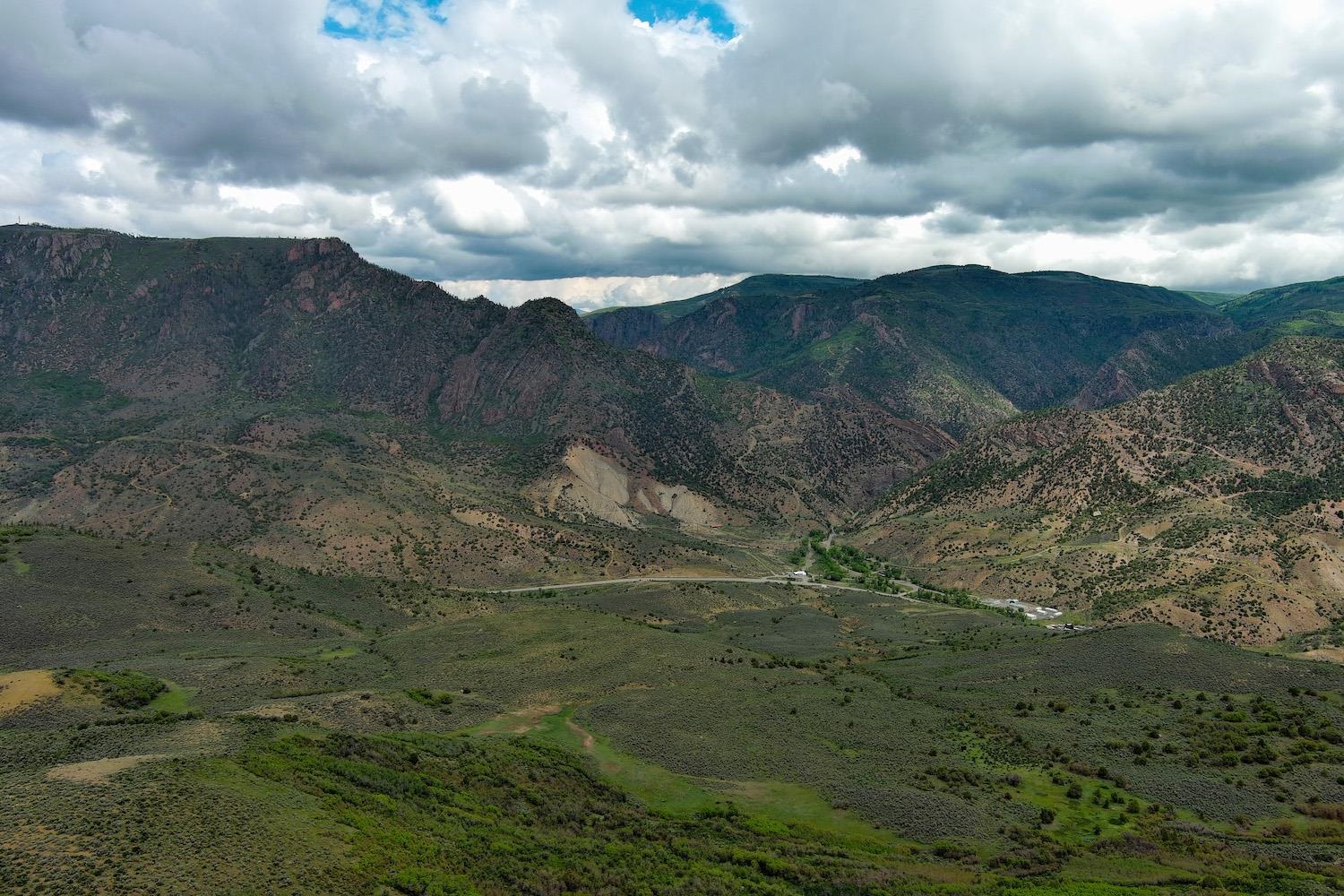 22000 P77 Road Montrose, CO 81403 - Photo 8 of 37 a view of a dry yard with green space