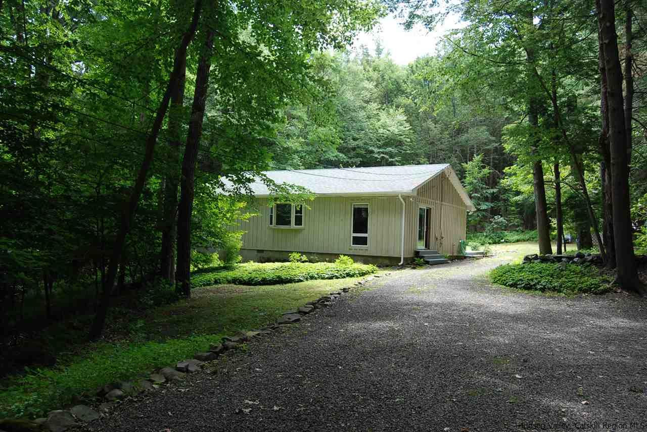 79 Iken Road Kerhonkson, NY 12446 - Photo 2 of 24 a front view of a house with garden