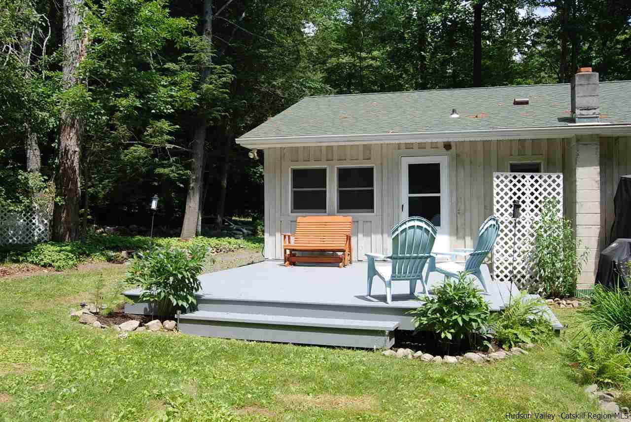 79 Iken Road Kerhonkson, NY 12446 - Photo 3 of 24 a house view with a garden space