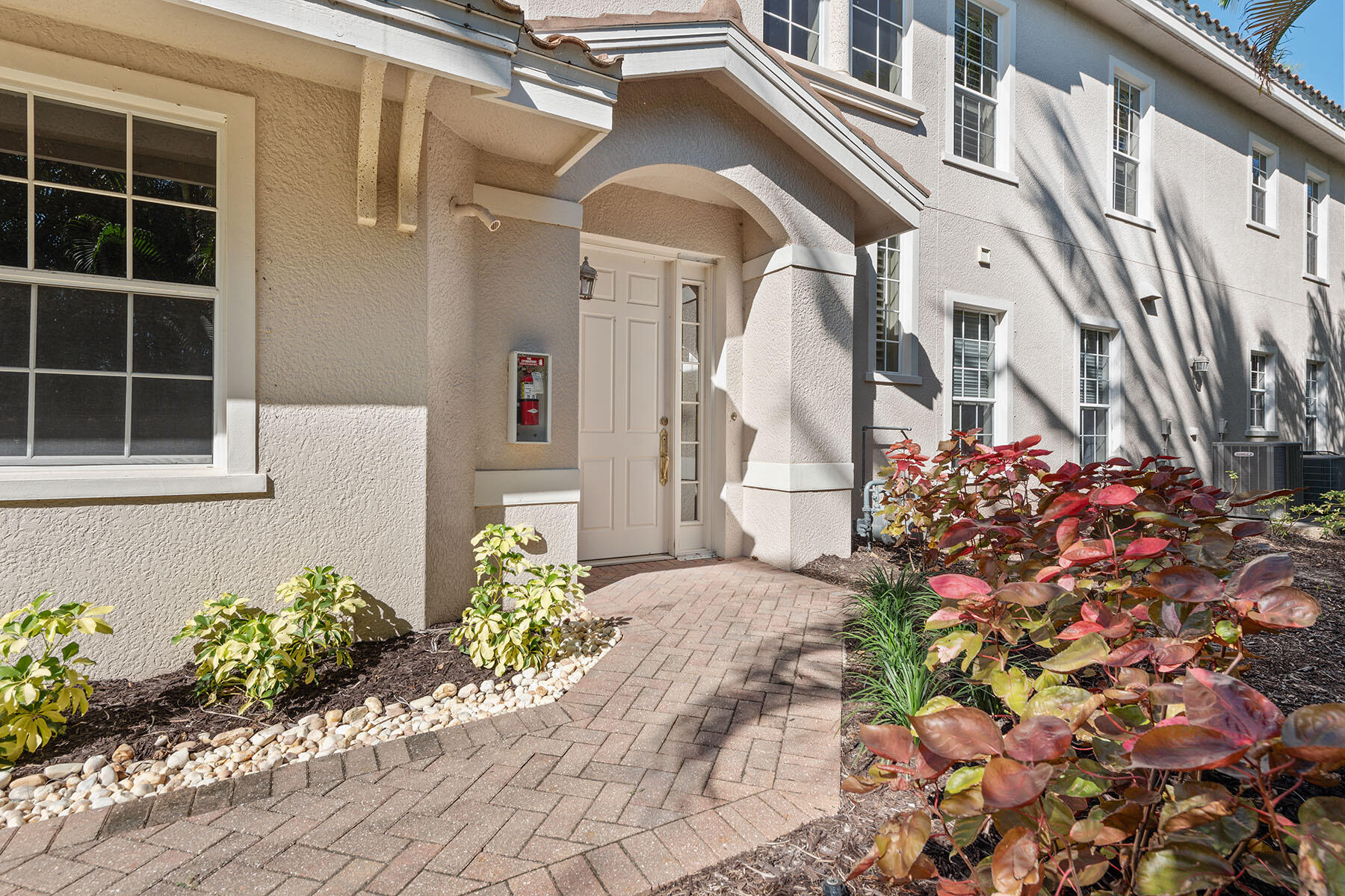 3189 Aviamar Circle, Unit 202 Naples, FL 34114 - Photo 34 of 50 a front view of a house