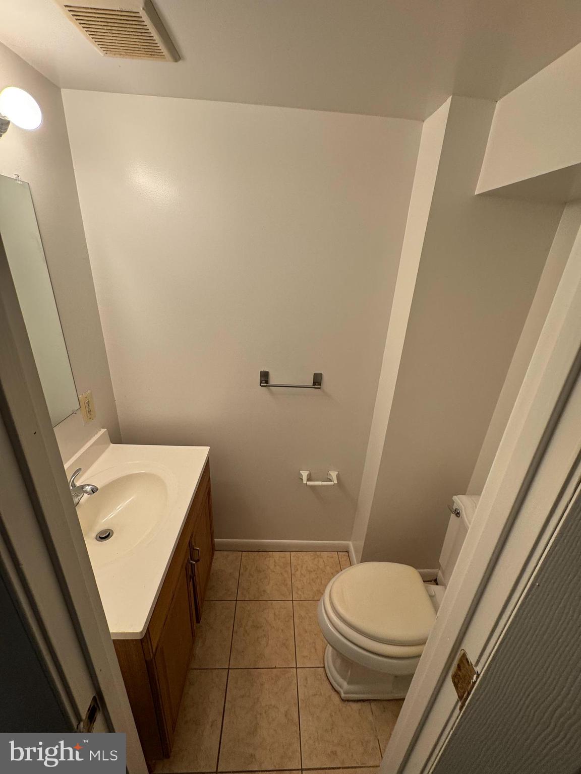 2167 Coralthorn Road Middle River, MD 21220 - Photo 11 of 23 a bathroom with a sink a toilet and shower