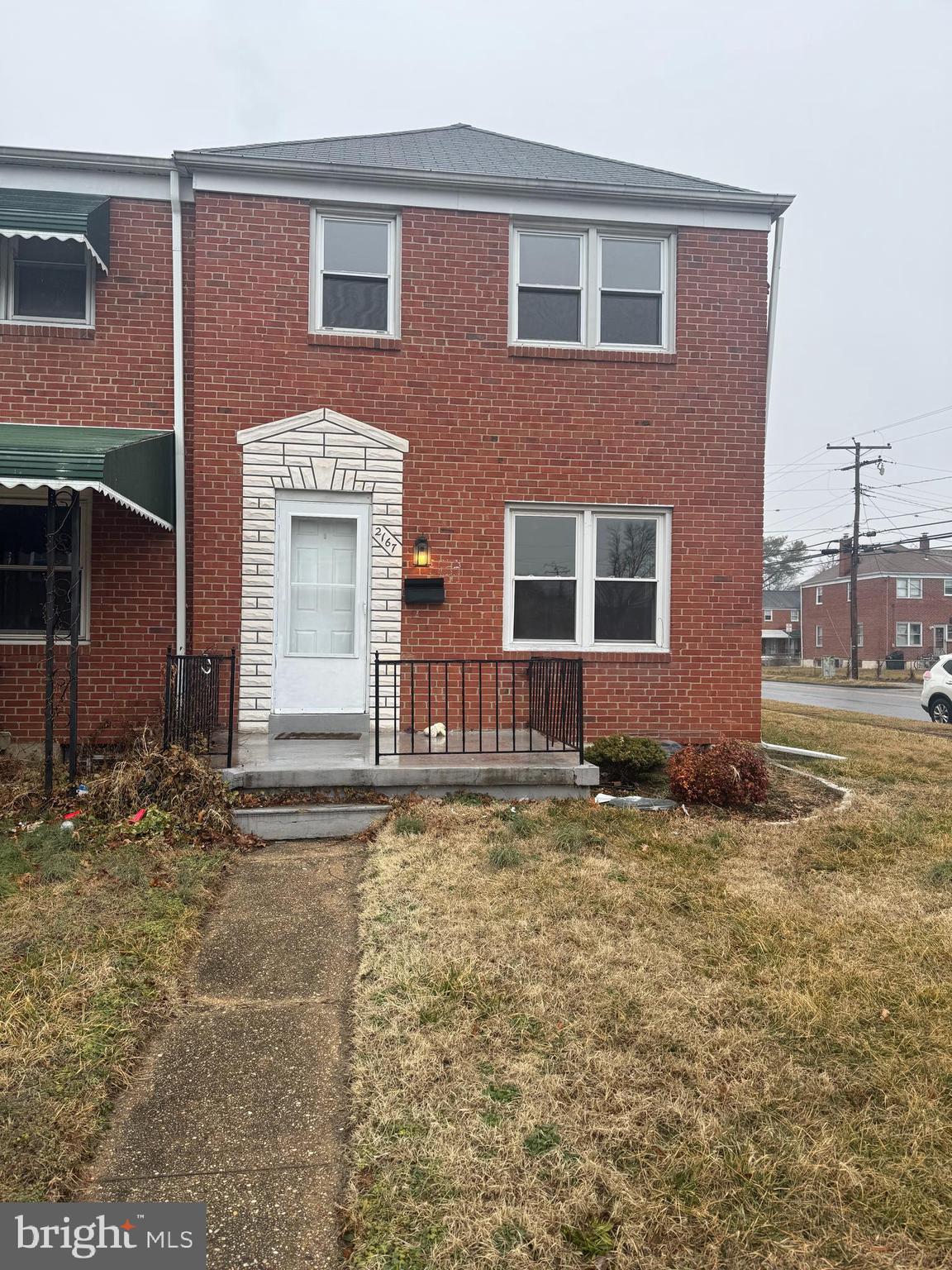 2167 Coralthorn Road Middle River, MD 21220 - Photo 2 of 23 a brick building that has a lots of windows on it