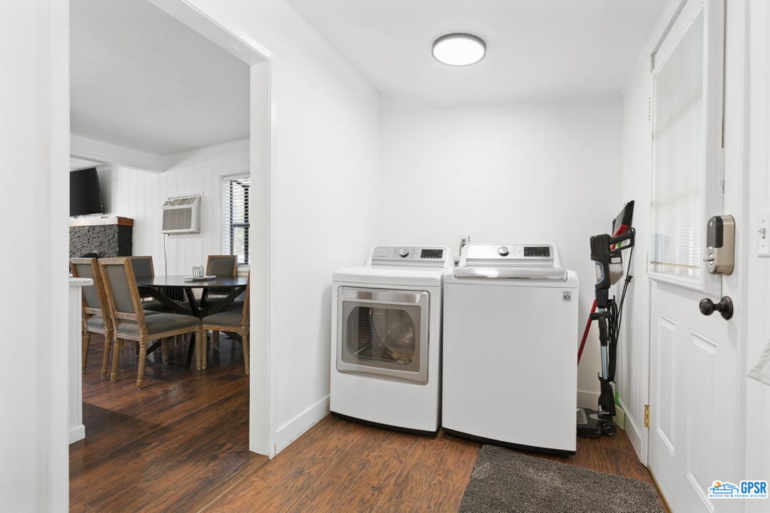 53335 Meadow Drive Idyllwild, CA 92549 - Photo 18 of 35 a utility room with cabinets dryer and washer