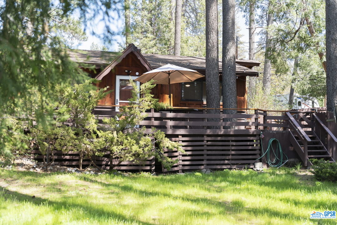 53335 Meadow Drive Idyllwild, CA 92549 - Photo 2 of 35 a view of a house with backyard and sitting area