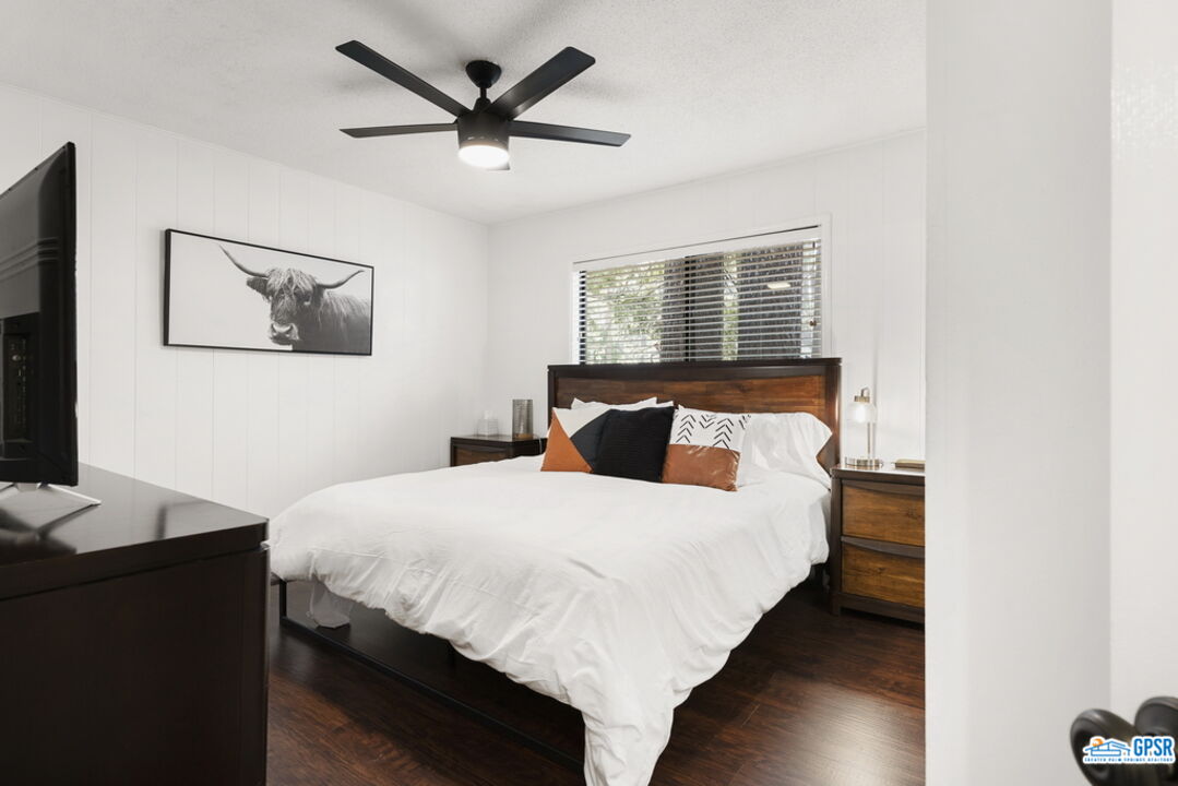 53335 Meadow Drive Idyllwild, CA 92549 - Photo 22 of 35 a bedroom with a bed and a desk