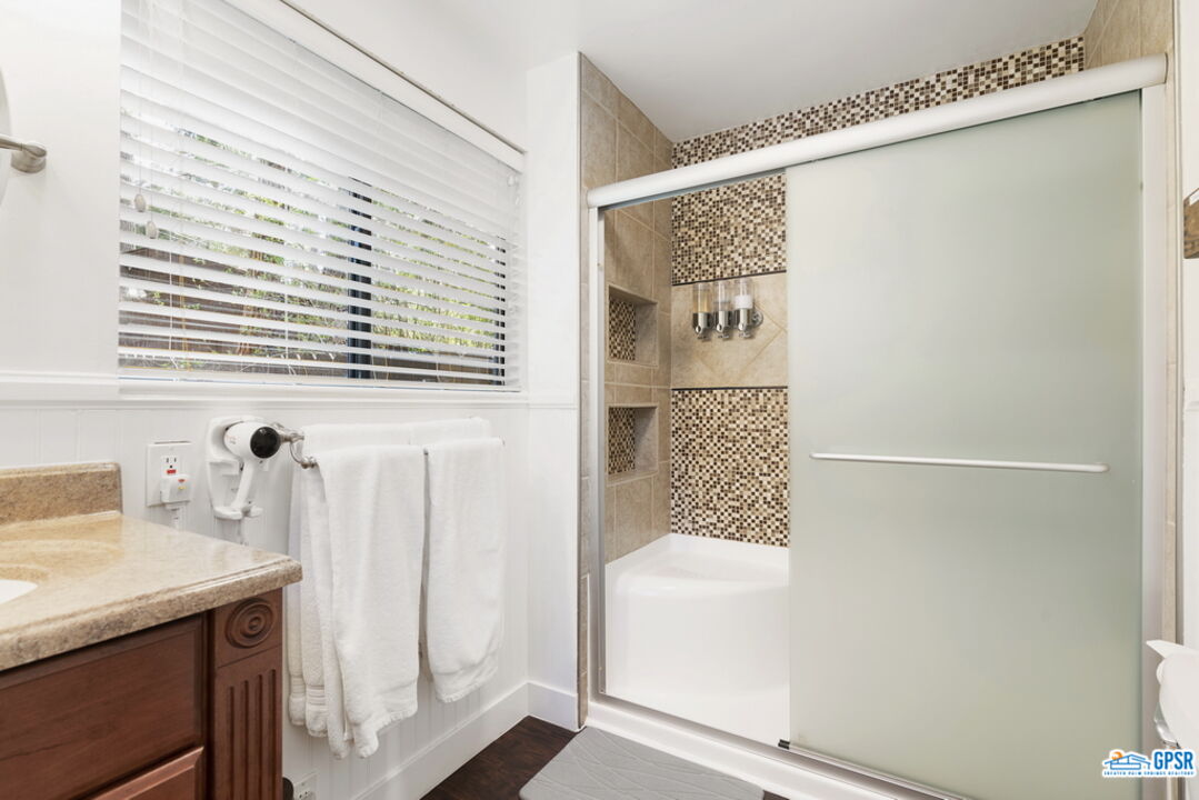 53335 Meadow Drive Idyllwild, CA 92549 - Photo 26 of 35 a bathroom with a shower and a sink
