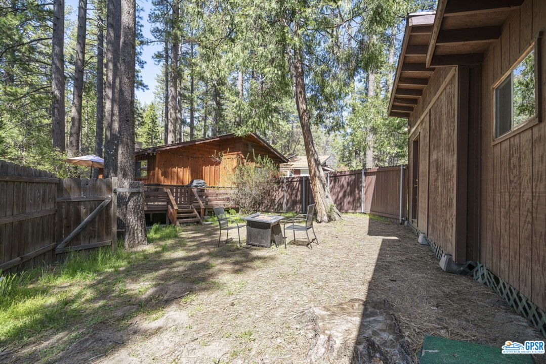53335 Meadow Drive Idyllwild, CA 92549 - Photo 31 of 35 a view of a house with backyard and sitting area