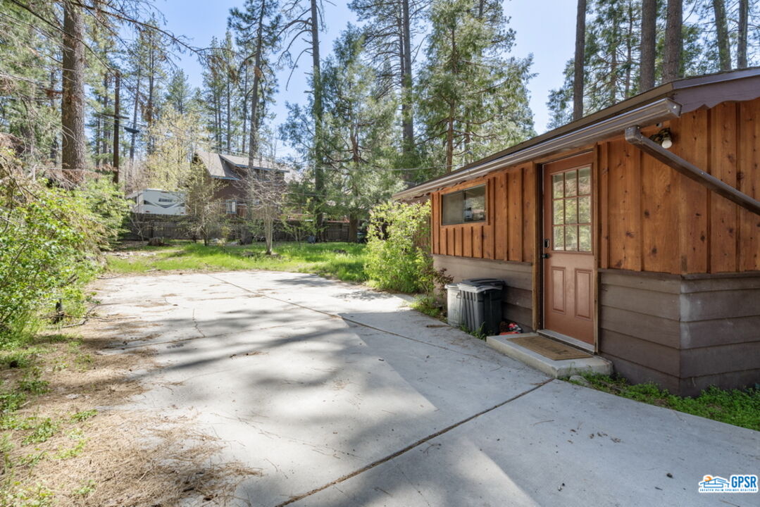 53335 Meadow Drive Idyllwild, CA 92549 - Photo 34 of 35 a view of a house with a small yard and wooden fence