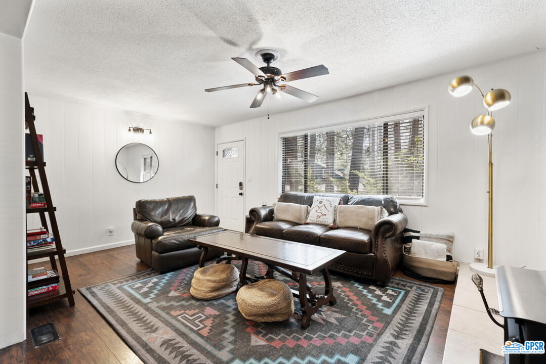 53335 Meadow Drive Idyllwild, CA 92549 - Photo 10 of 35 a living room with furniture and a table