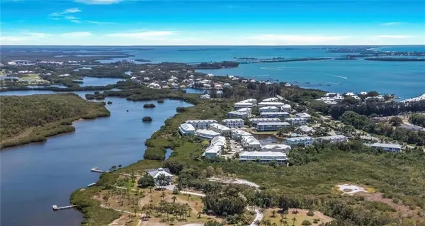 a view of a city with an ocean