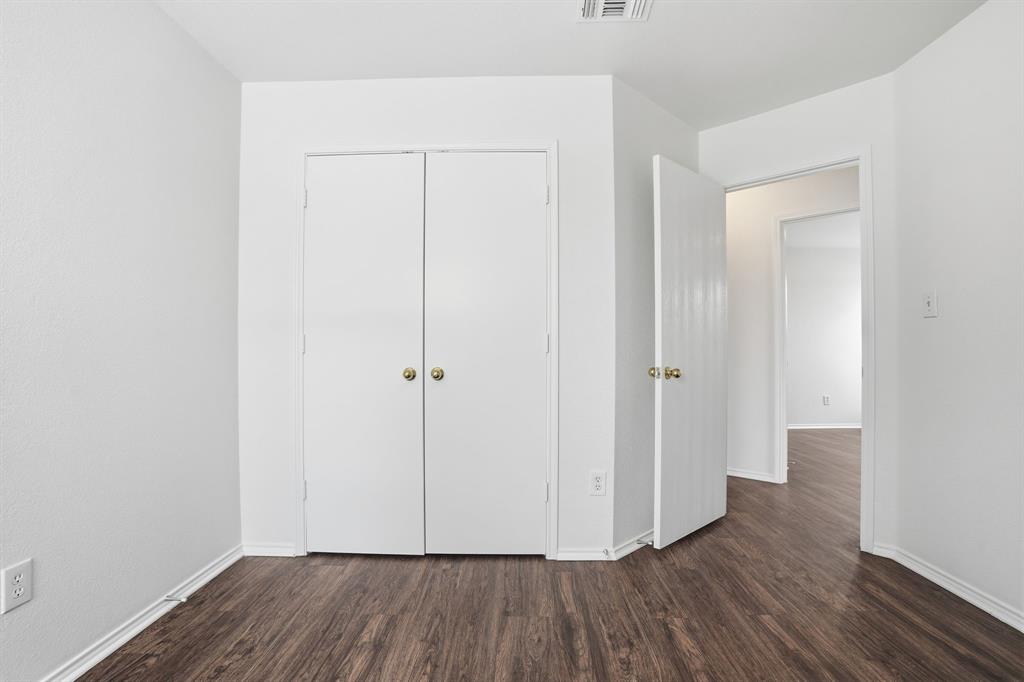 1000 Caleb Street Burleson, TX 76028 - Photo 18 of 27 a view of a room with wooden floor