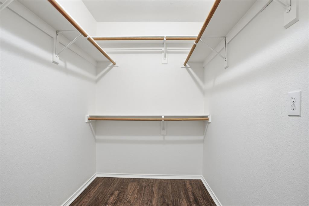 1000 Caleb Street Burleson, TX 76028 - Photo 20 of 27 a view of an empty walk in closet