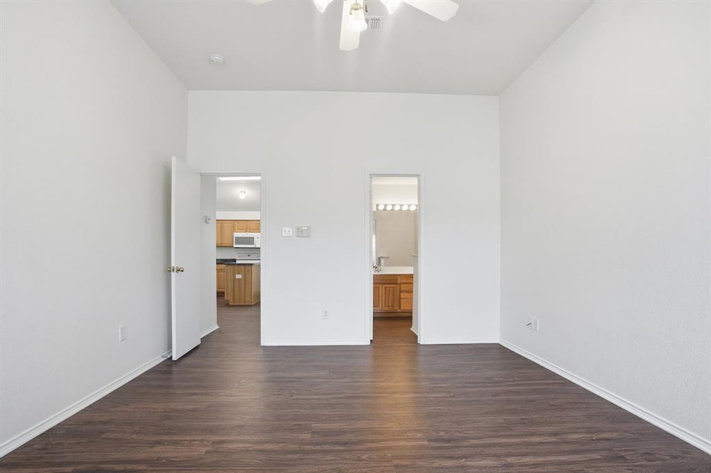 1000 Caleb Street Burleson, TX 76028 - Photo 21 of 27 a view of empty room with wooden floor