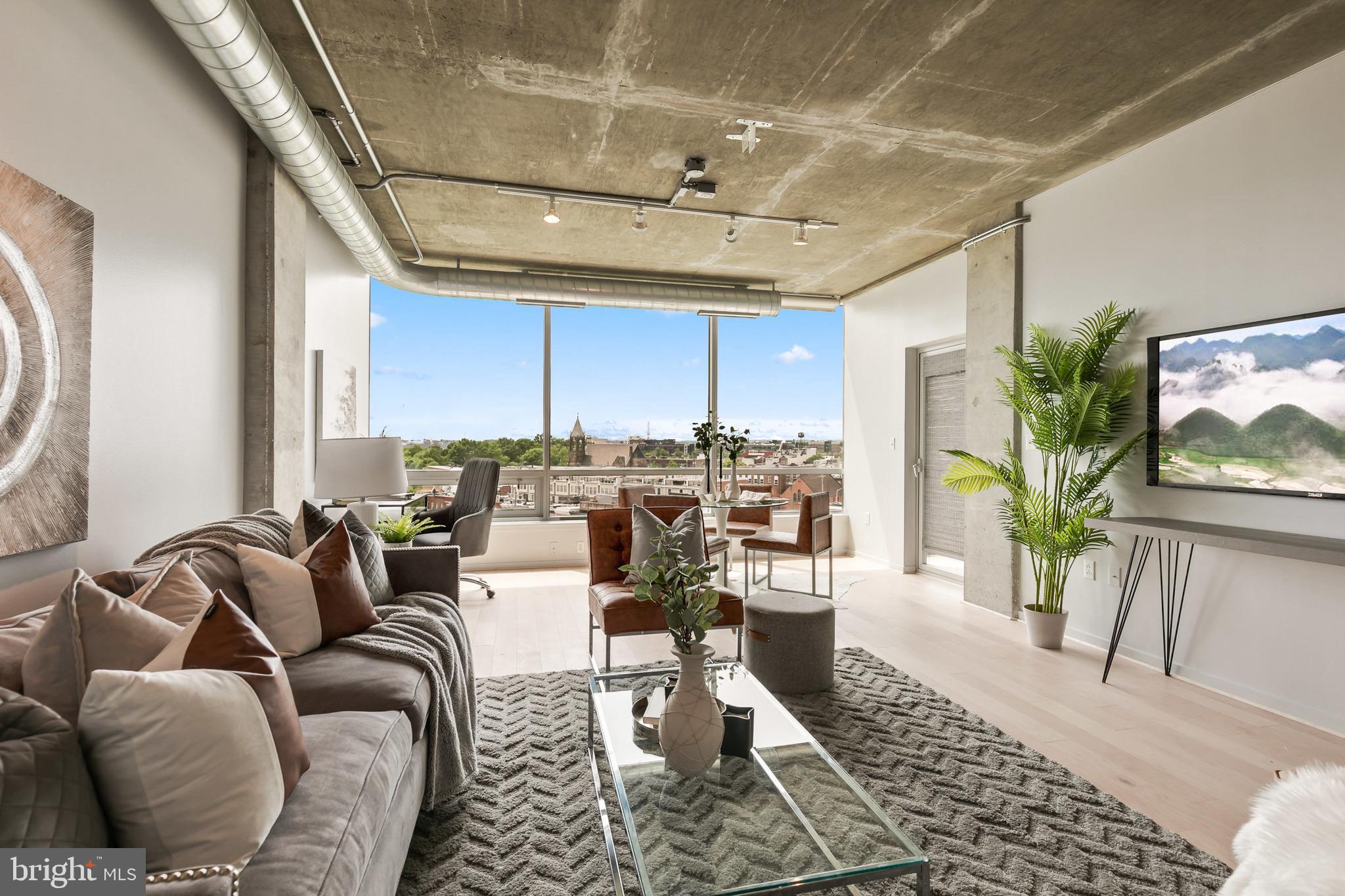 1200 Steuart Street, Unit 625 Baltimore, MD 21230 - Photo 6 of 71 Motorized blinds help control light & filter views