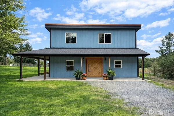 a house view with a outdoor space