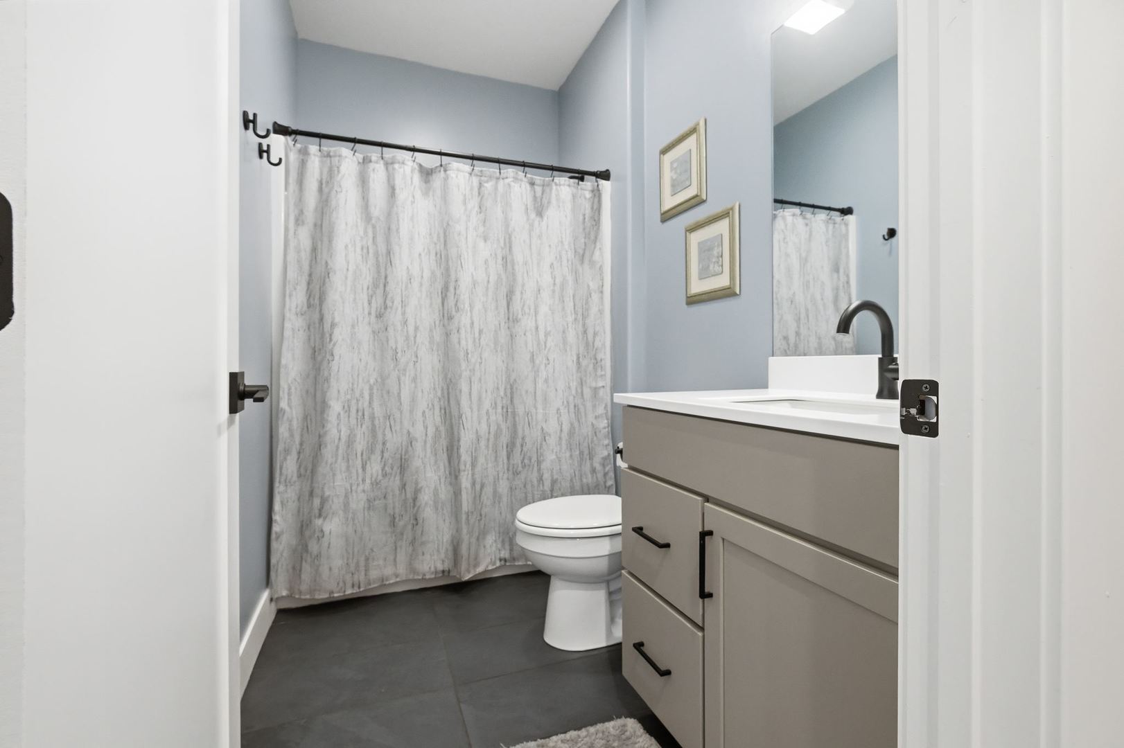 1216 Granite Way Normal, IL 61761 - Photo 6 of 33 a bathroom with a sink toilet and a mirror