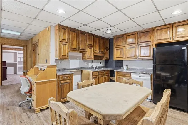 a kitchen that has a cabinets counter space and appliances