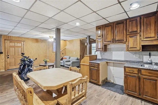 a very nice looking kitchen with a large window