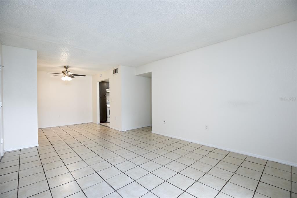 954 Lake Destiny Road, Unit H Altamonte Springs, FL 32714 - Photo 6 of 17 a view of an empty room and window