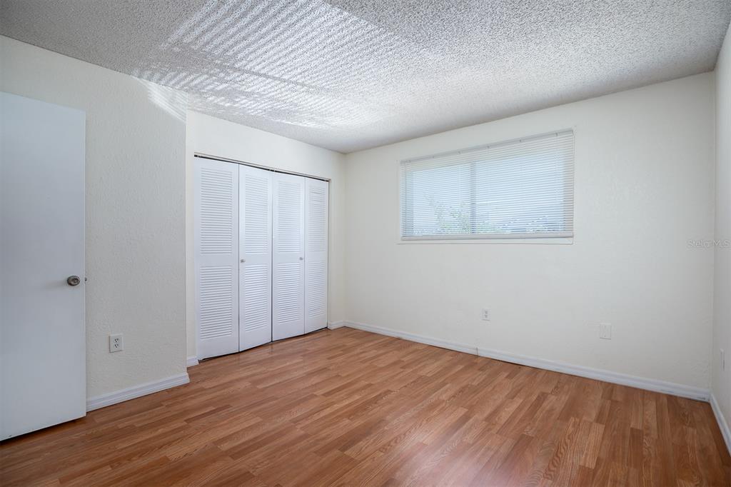 954 Lake Destiny Road, Unit H Altamonte Springs, FL 32714 - Photo 10 of 17 a view of empty room with wooden floor