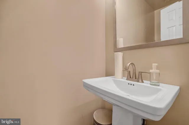 a bathroom with a sink and a toilet