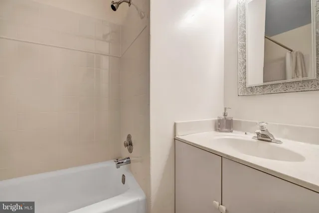 a bathroom with a sink and a bathtub