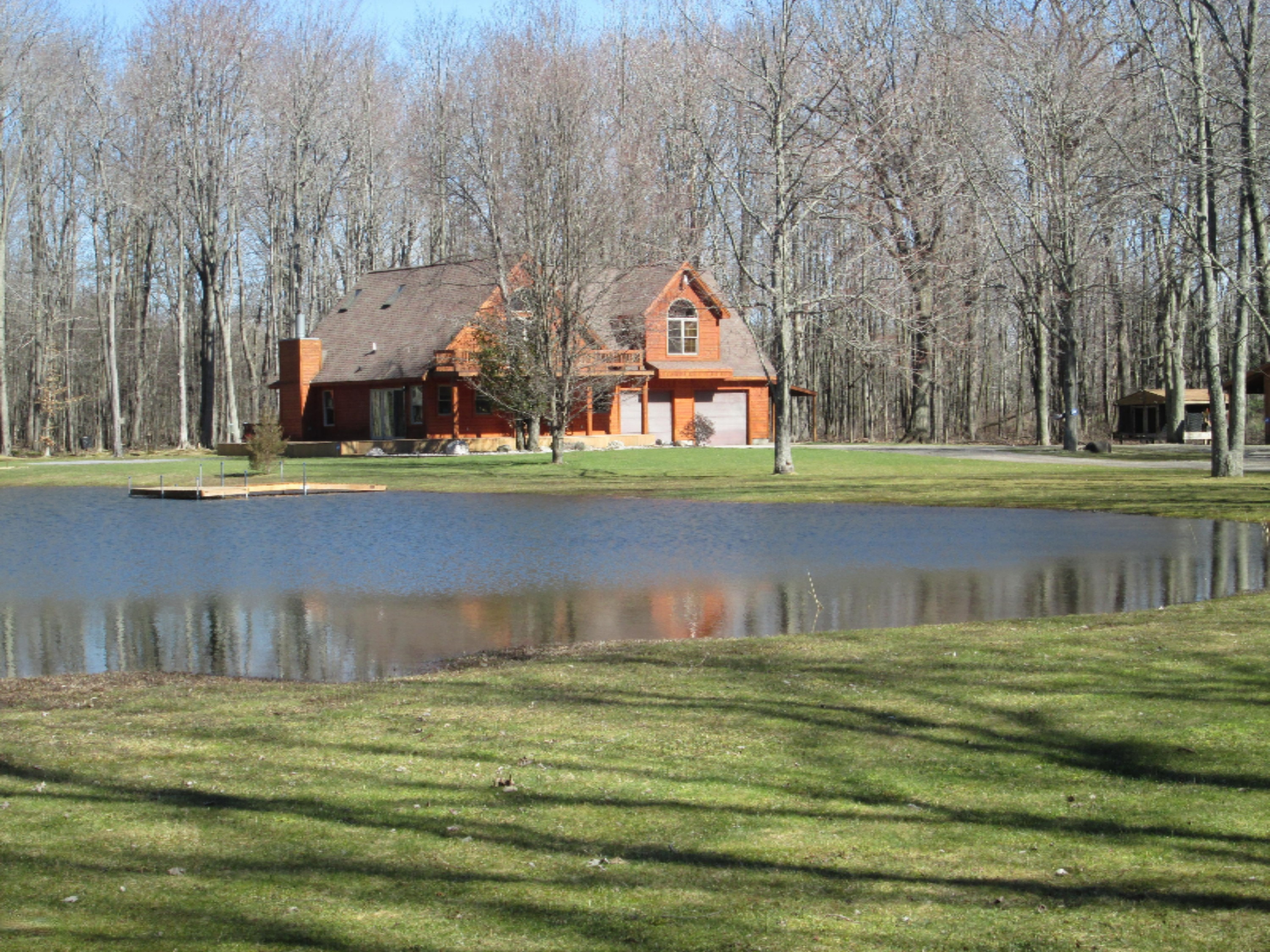 1224 Agard Road Muskegon, MI 49445 - Photo 2 of 27 West Side over pond