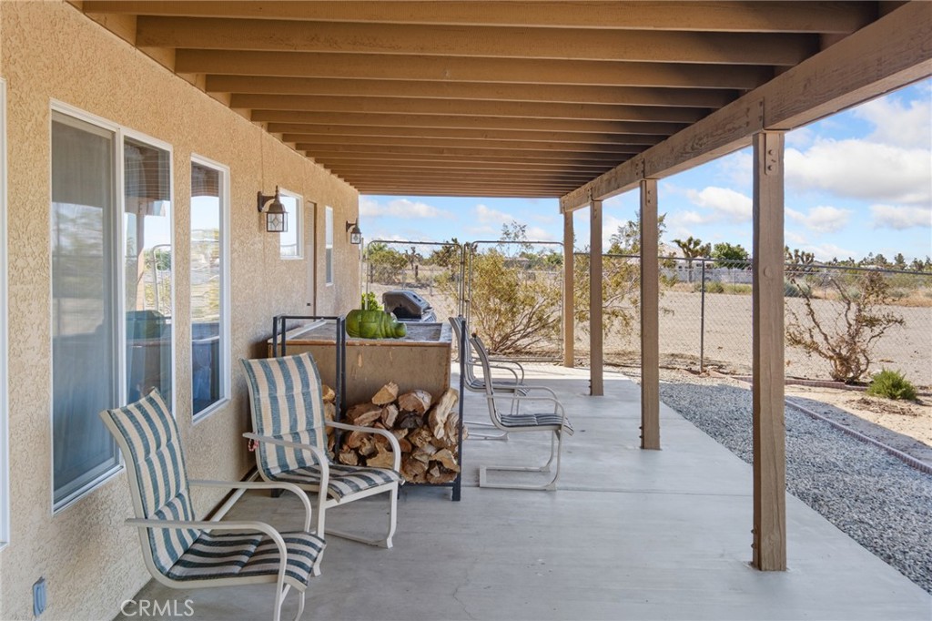 11025 El Esteban Road Phelan, CA 92371 - Photo 39 of 54 a view of a dining room with furniture window and outside view