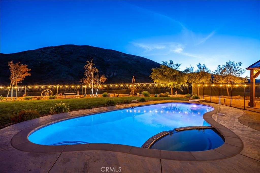 2862 Calmgarden Road Acton, CA 93510 - Photo 39 of 69 a view of swimming pool with an outdoor seating