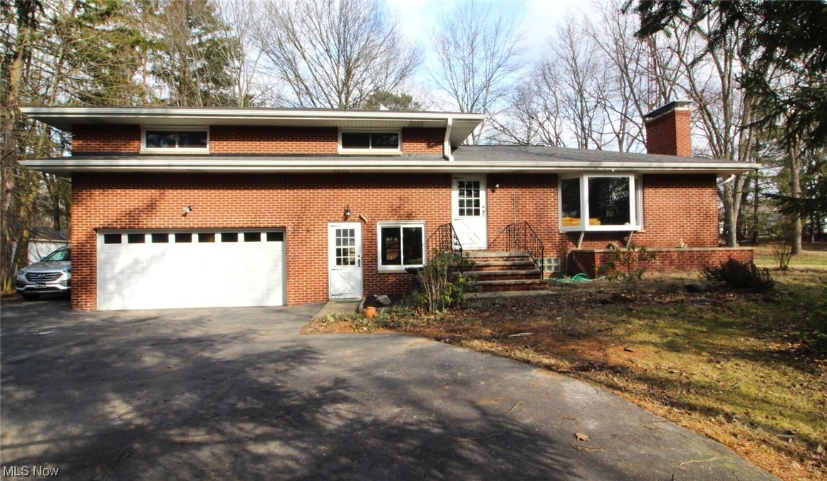1609 Graham Road Stow, OH 44224 - Photo 1 of 35 Split level home with a garage
