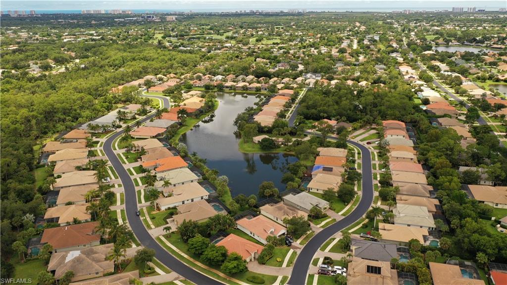 16188 Parque Lane Naples, FL 34110 - Photo 3 of 15 an aerial view of residential houses with outdoor space