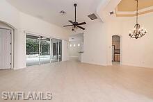 16188 Parque Lane Naples, FL 34110 - Photo 4 of 15 a view of a room with a ceiling fan