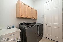 16188 Parque Lane Naples, FL 34110 - Photo 10 of 15 a view of a kitchen with electric appliances