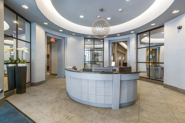 a large living room with a large tub