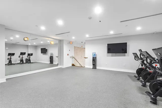 a view of a room with gym equipment