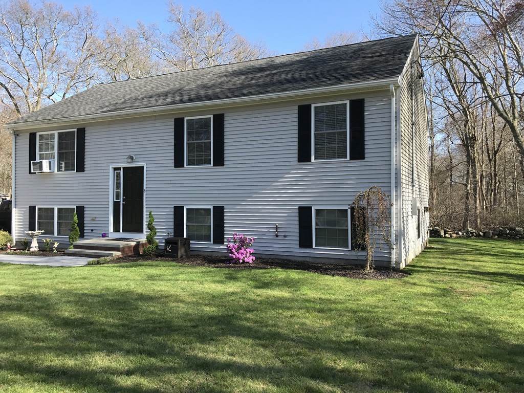 3 Diamond Street Fairhaven, MA 02719 - Photo 2 of 17 a front view of house with yard and green space