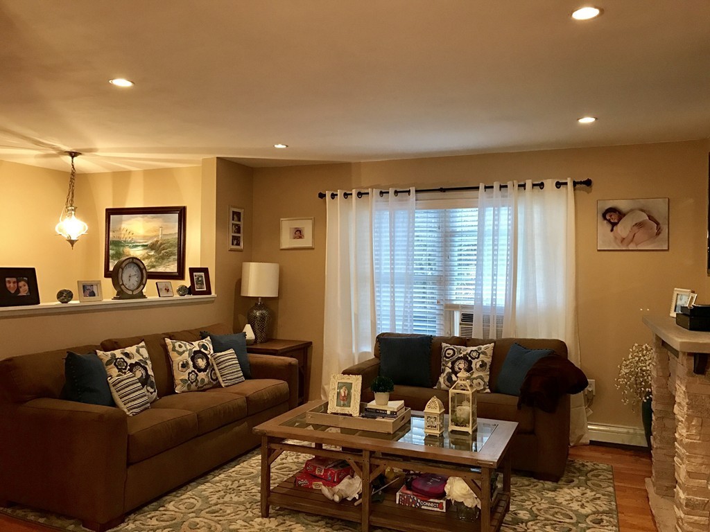 3 Diamond Street Fairhaven, MA 02719 - Photo 6 of 17 a living room with furniture and a large window