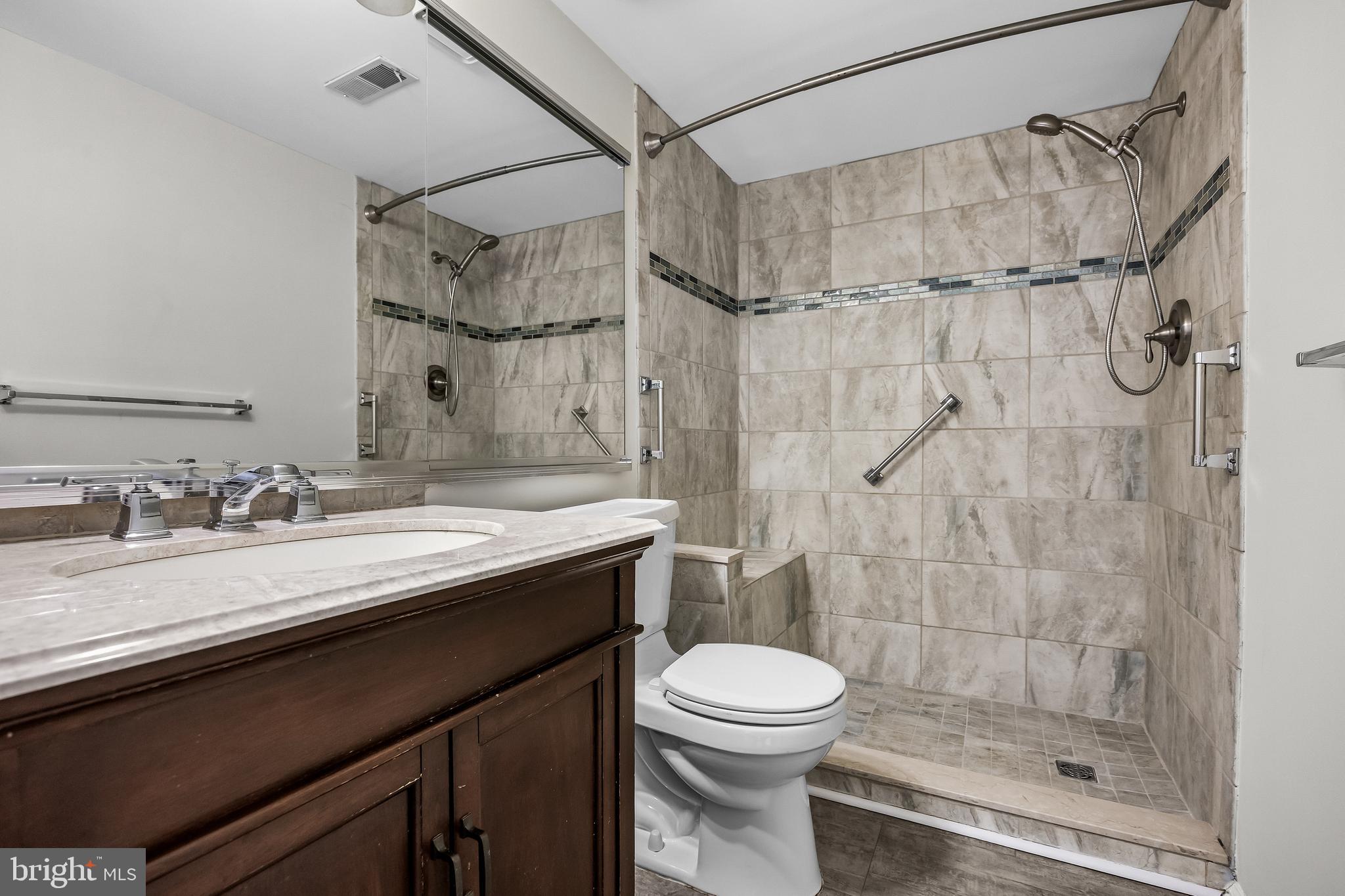 23 Emory Lane Mount Laurel, NJ 08054 - Photo 20 of 23 a bathroom with a sink a toilet and shower