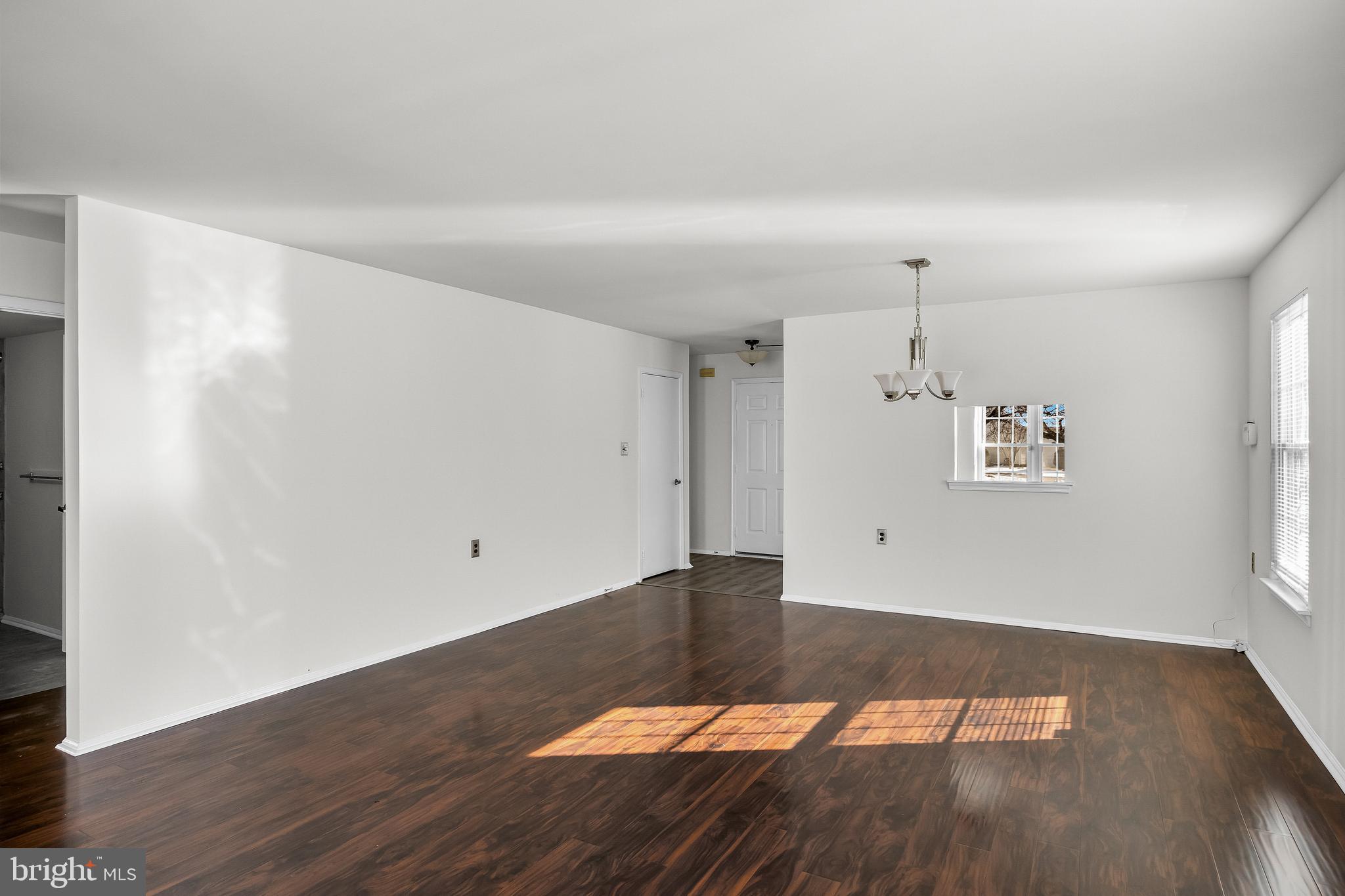 23 Emory Lane Mount Laurel, NJ 08054 - Photo 7 of 23 an empty room with wooden floor