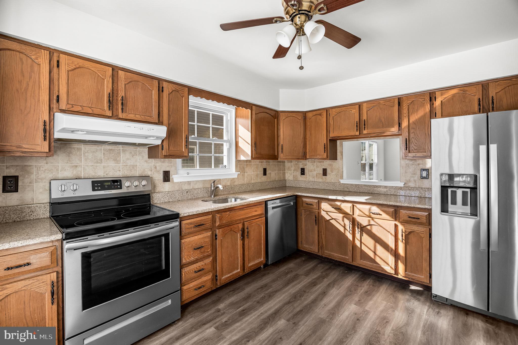 23 Emory Lane Mount Laurel, NJ 08054 - Photo 9 of 23 a kitchen with stainless steel appliances granite countertop a stove sink and refrigerator
