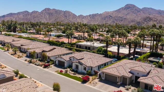 a view of a town with couple of houses