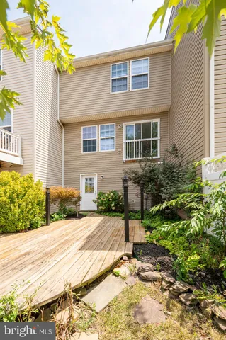 a view of a backyard of the house